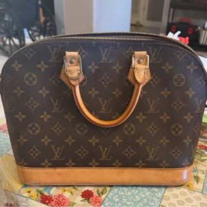 Louis Vuitton “Alma” Classic Monogram Satchel